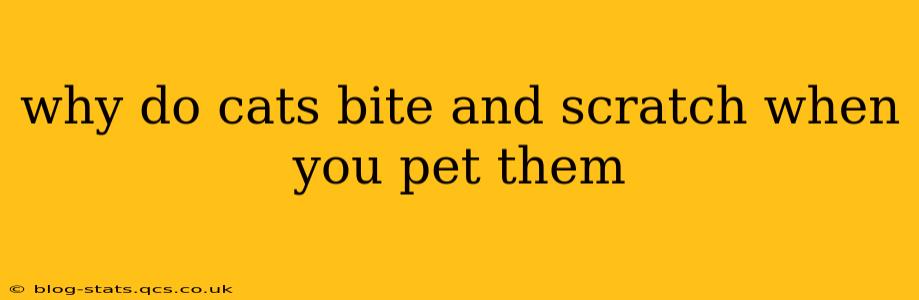 why do cats bite and scratch when you pet them